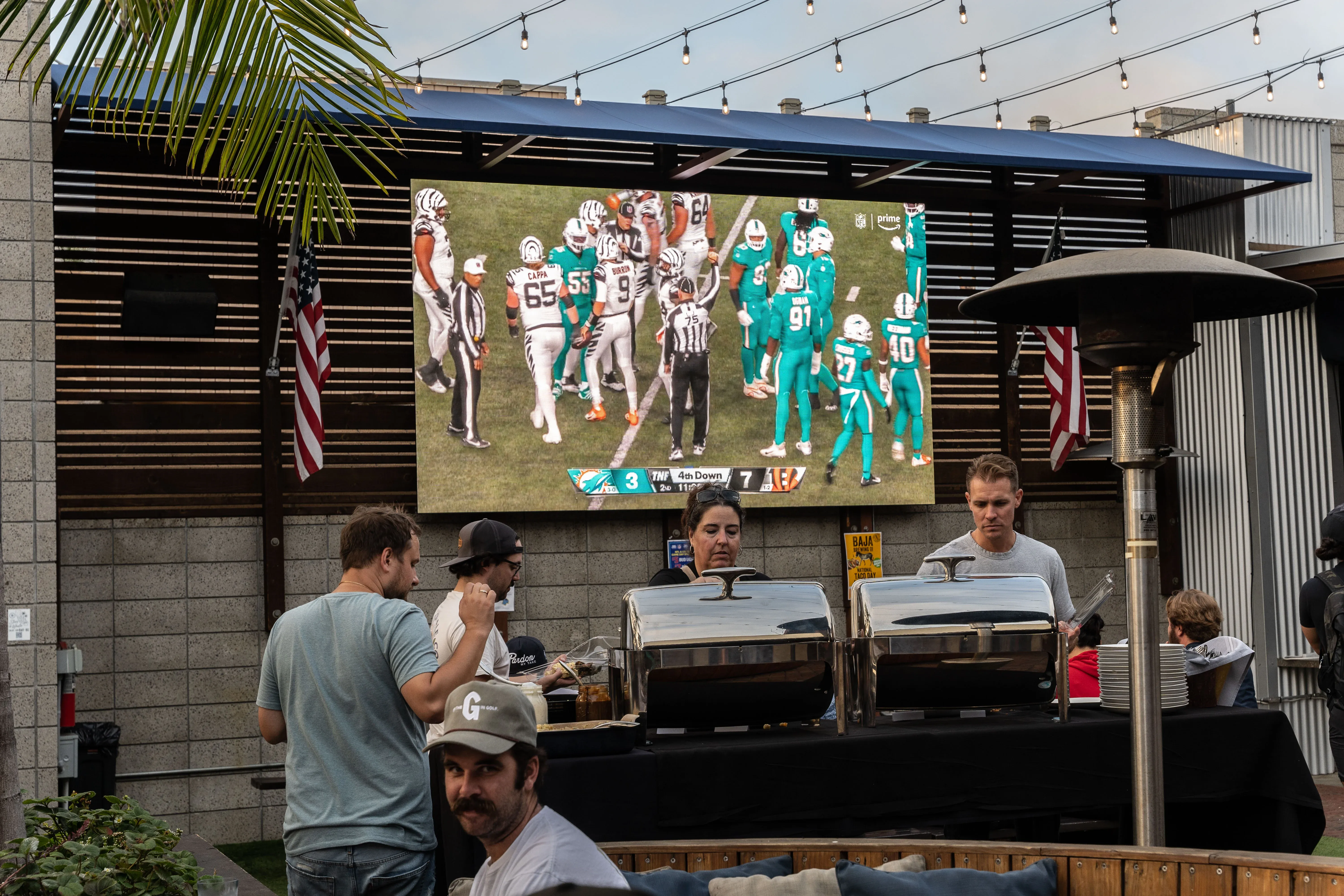 College football watch party crowd at Park 101 in Carlsbad Village