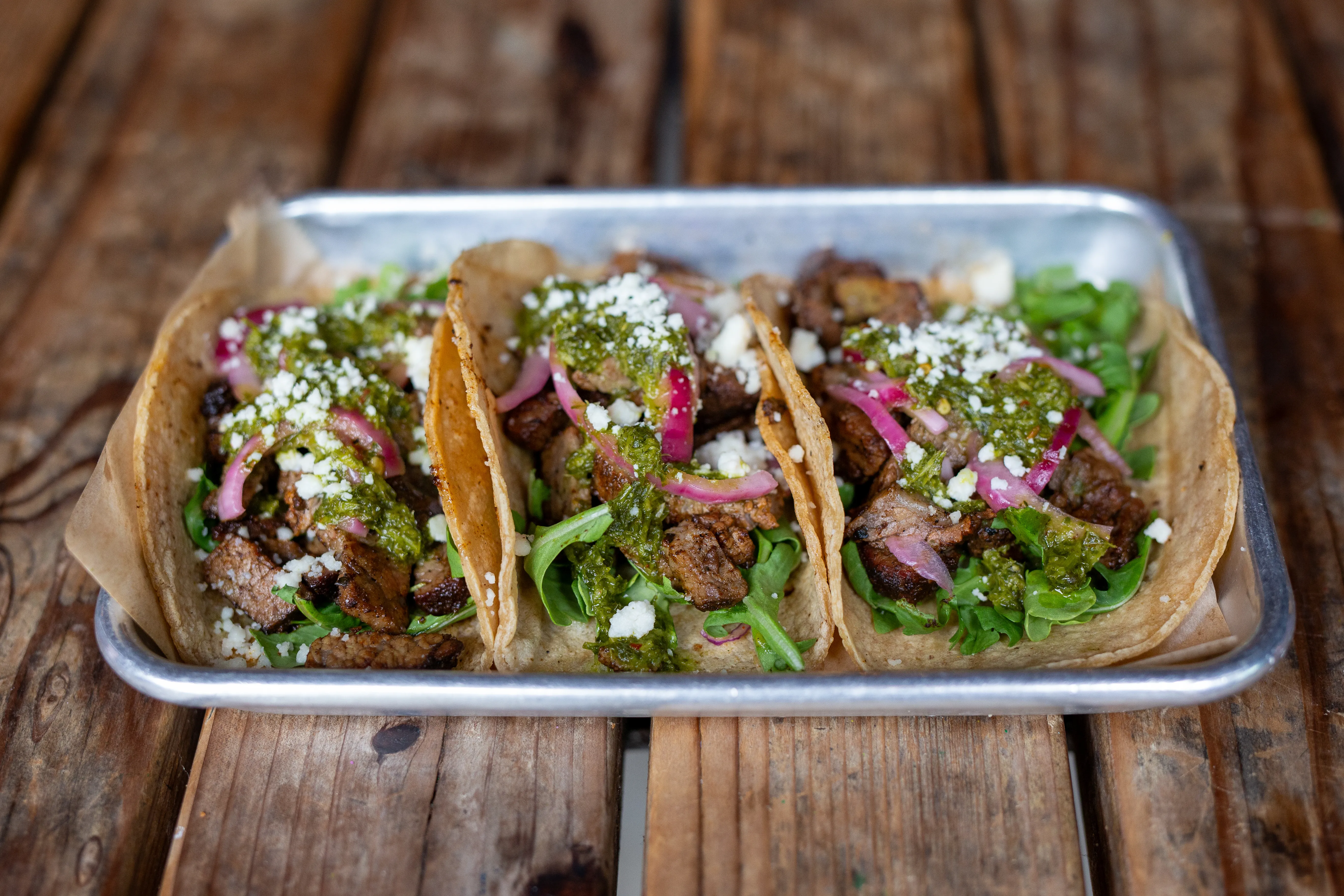 Smoked beef tacos with chimichurri and cotija at Park 101 Carlsbad
