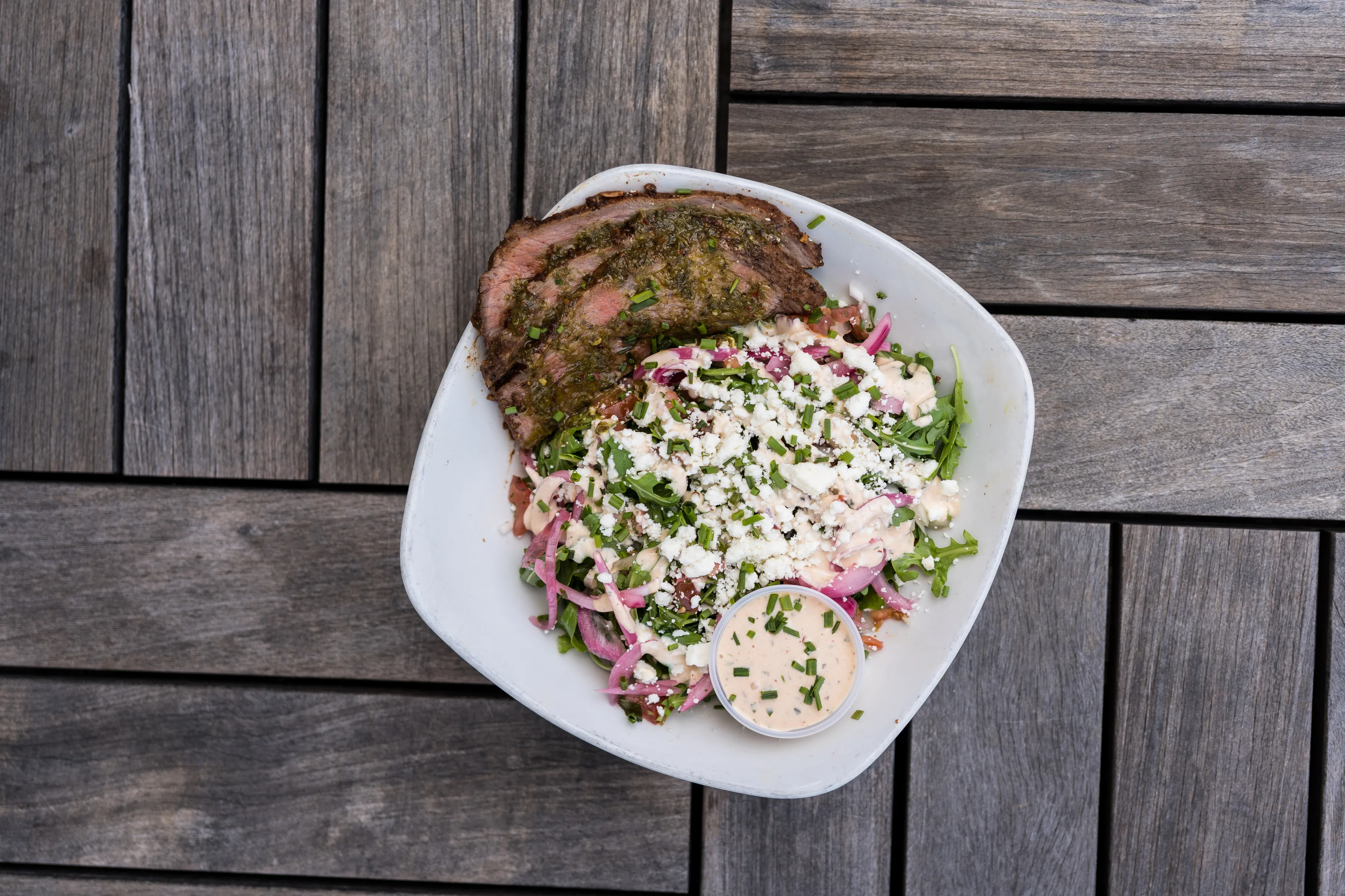 Tri-Tip x Arugula salad with pickled onion and cotija at Park 101 Carlsbad